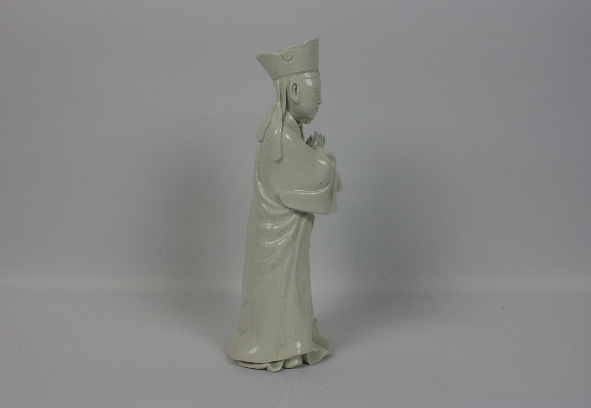 040 A Chinese blanc-de-chine porcelain figure of a scholar official