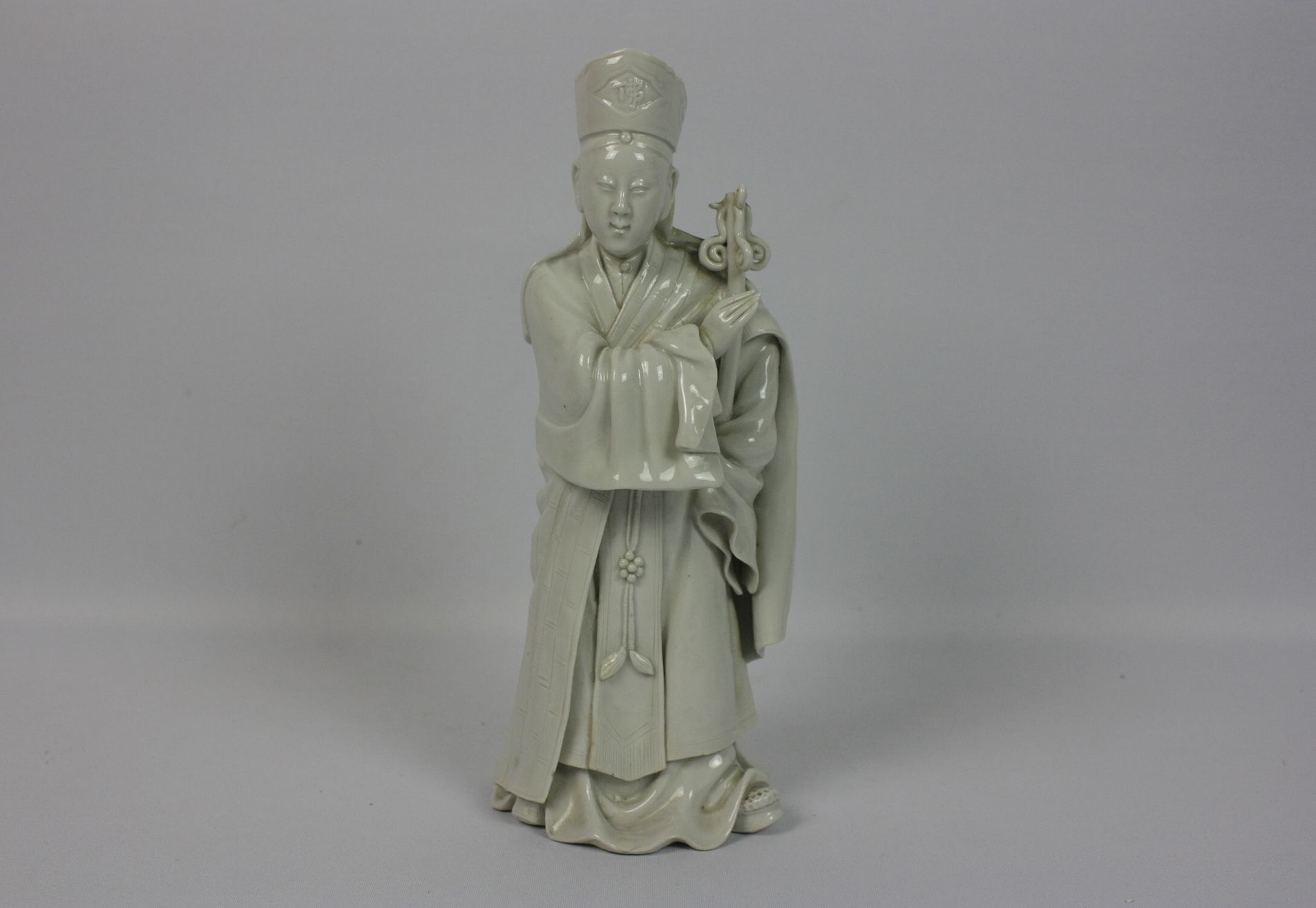 040 A Chinese blanc-de-chine porcelain figure of a scholar official