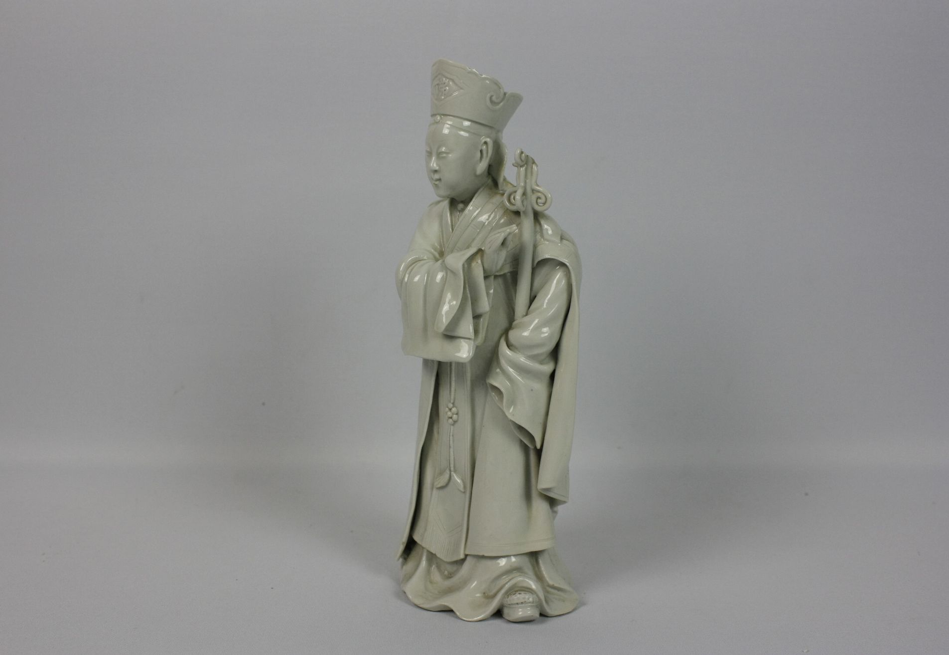 040 A Chinese blanc-de-chine porcelain figure of a scholar official