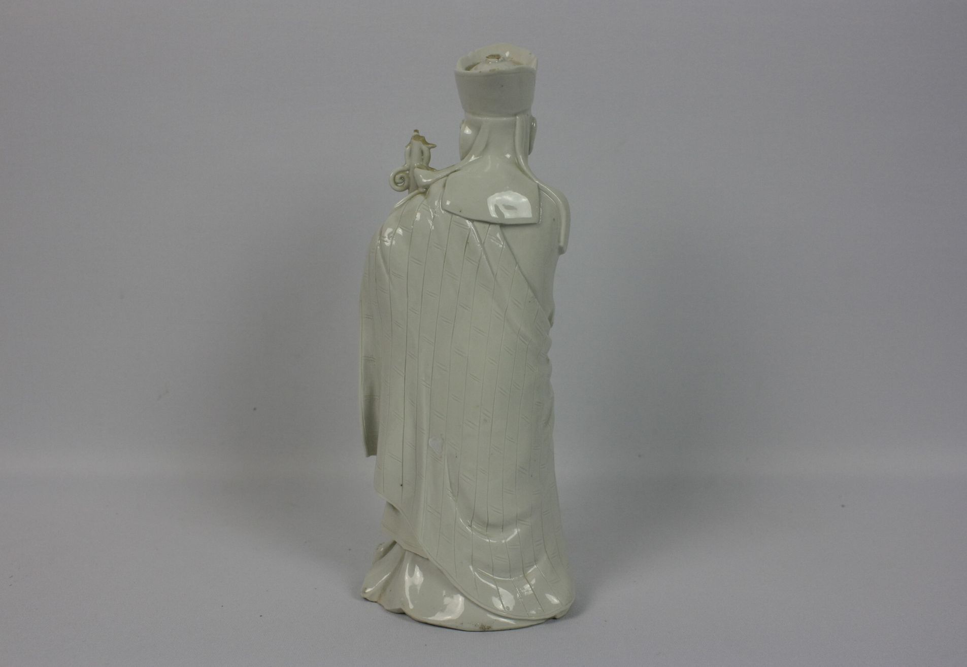 040 A Chinese blanc-de-chine porcelain figure of a scholar official