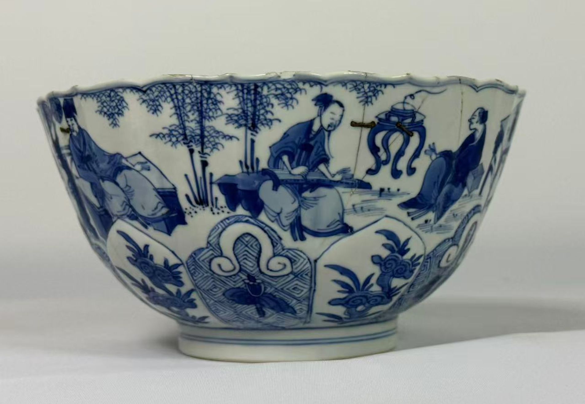 021 Kangxi Period Blue and White ‘Seven Sages of the Bamboo Grove’ Bowl with Molded Lotus Petal Decoration, Qing Dynasty